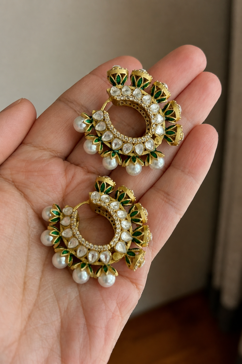 Gulnaar Hoops by KINAHH hand-held view with brass hoop styling, enamel work, pearl detail, and moissanite polki accents.