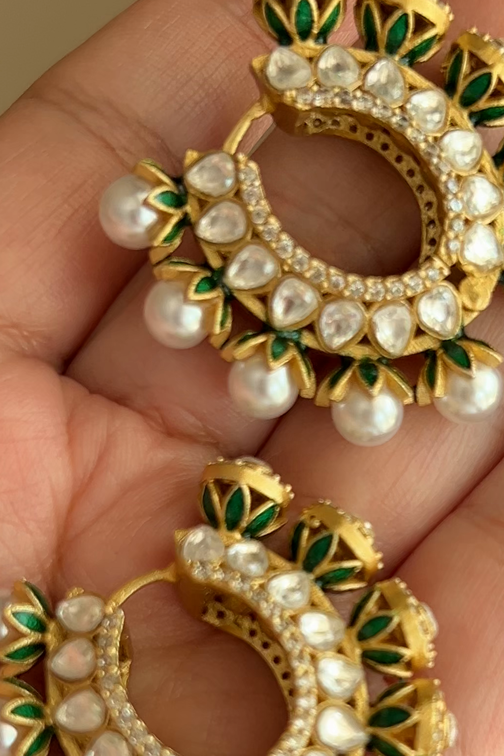 Gulnaar Hoops by KINAHH close detail view of brass work, enamel detailing, pearl accent, and moissanite polki.