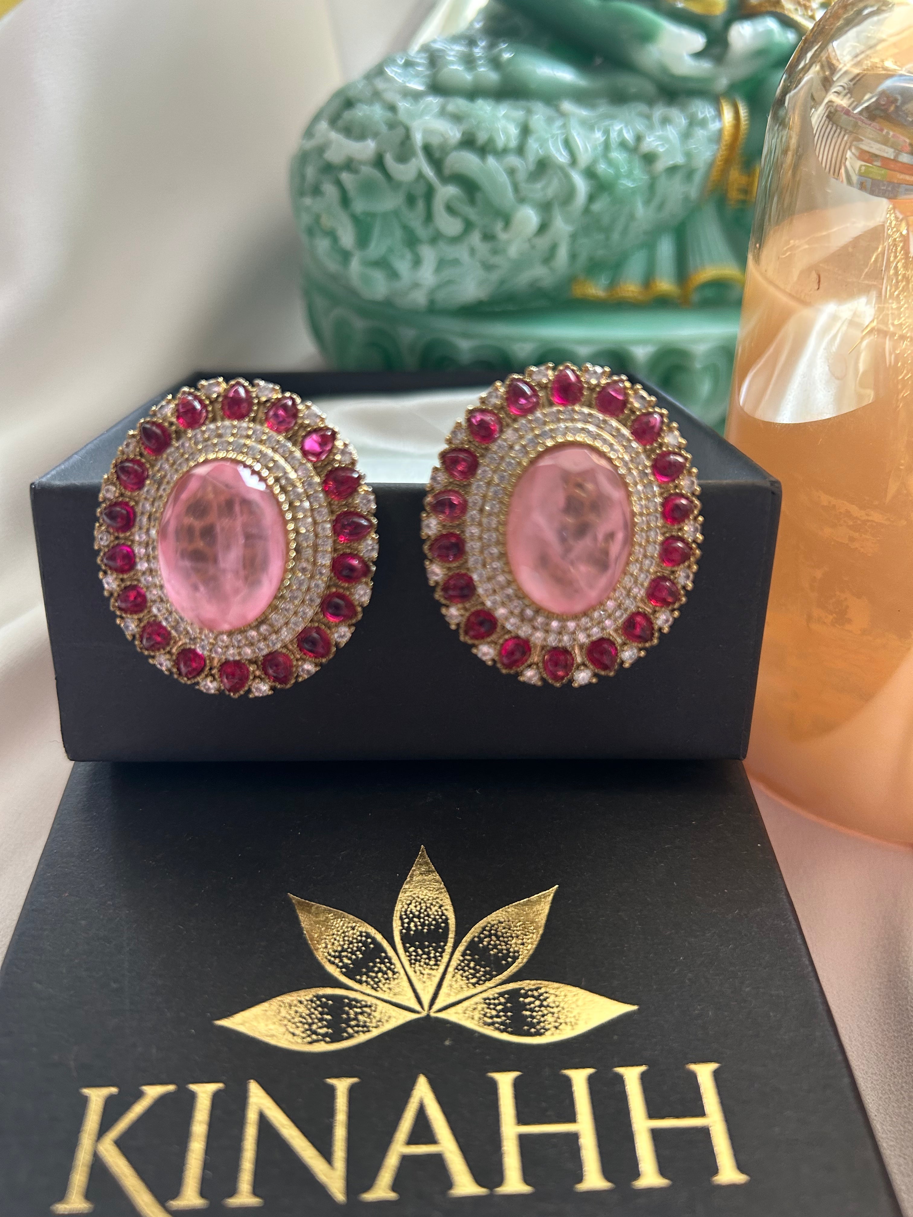 Gulaab Earrings detail view showing doublet pink stone and red semi-precious stones in brass.