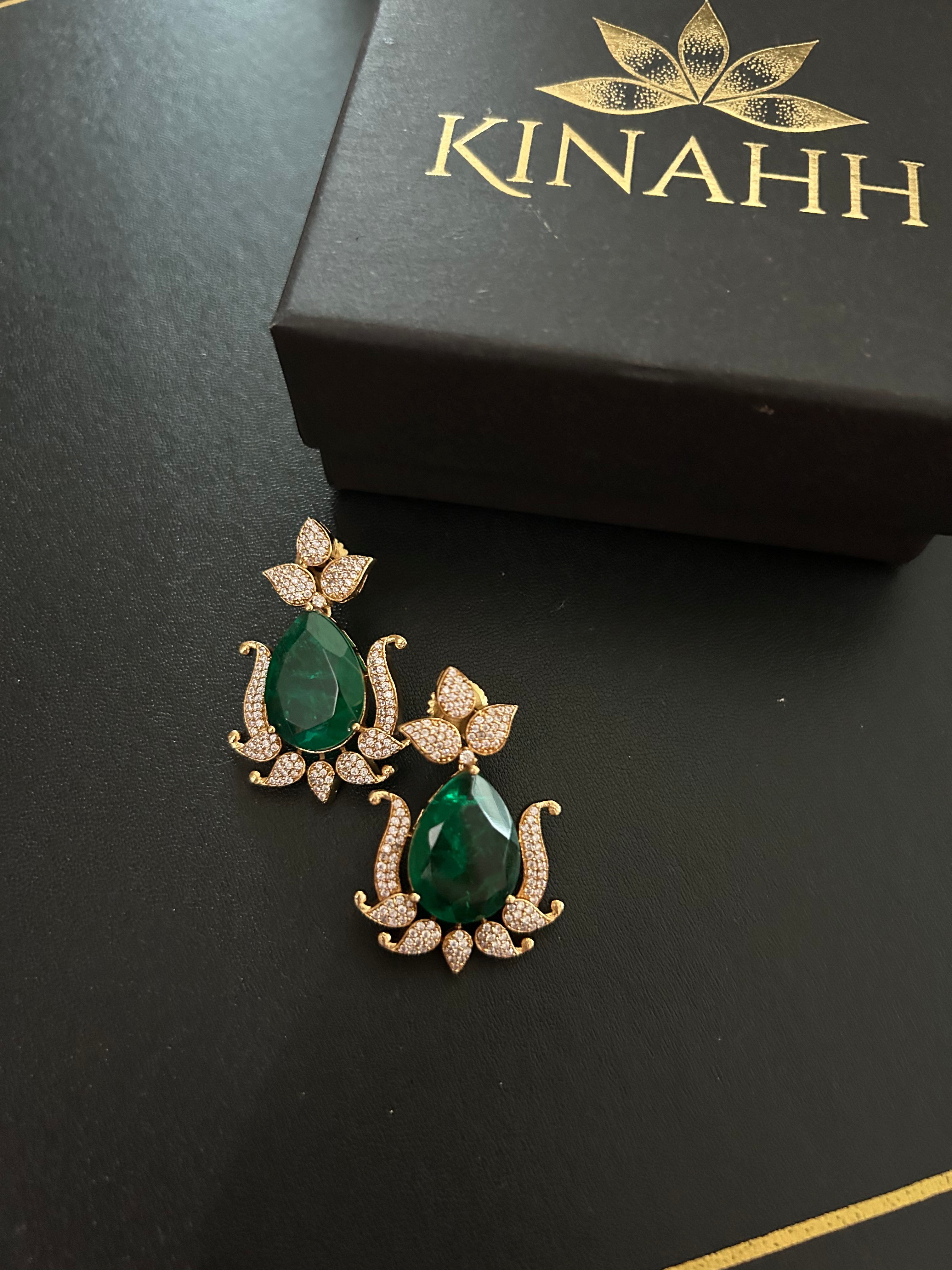 Gul Earrings by KINAHH with double green stones and American diamond accents in brass.