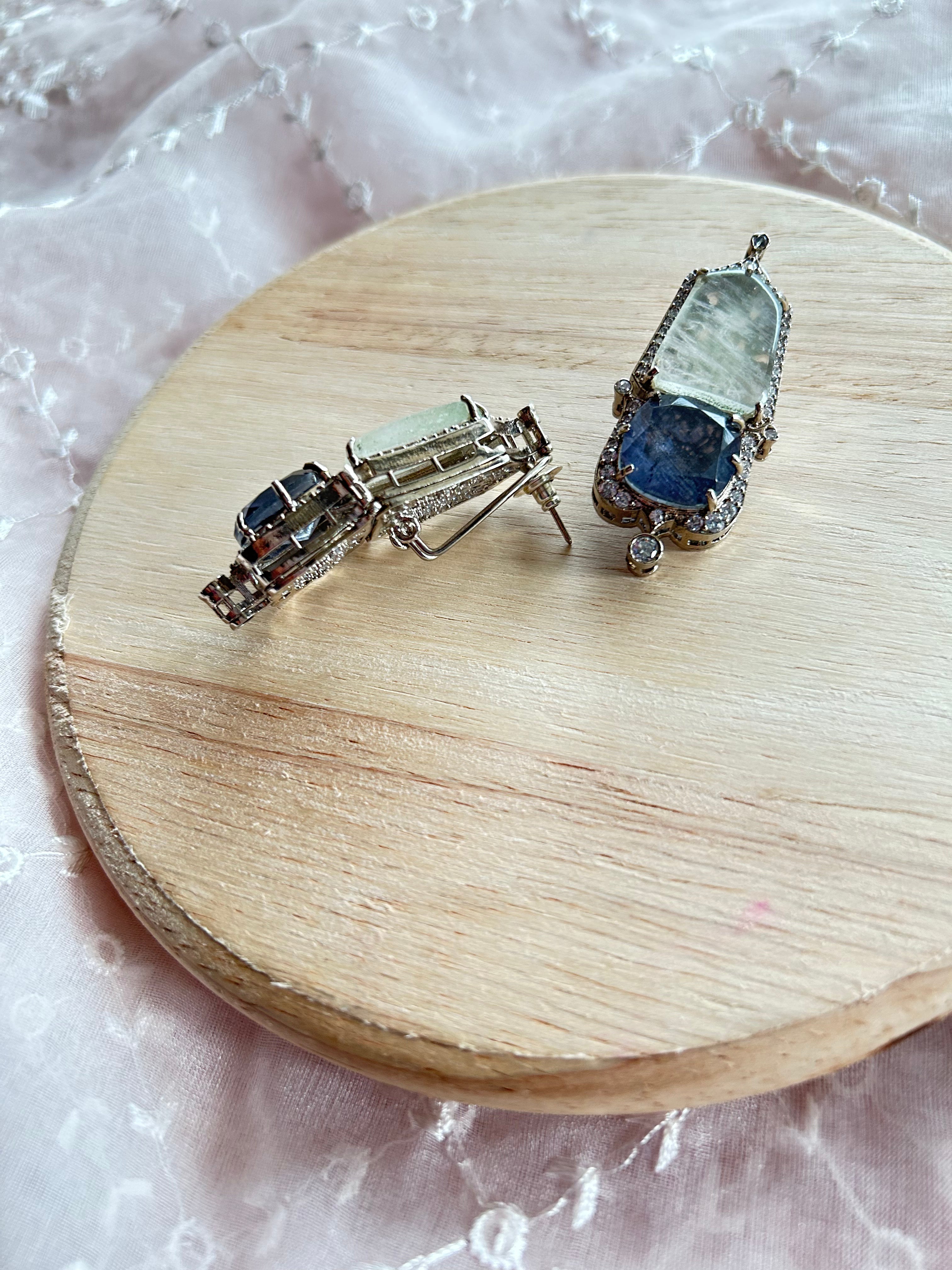 Inaara Earrings alternate view 3 showing doublet stones, back carving and rhodium plating on silver alloy.
