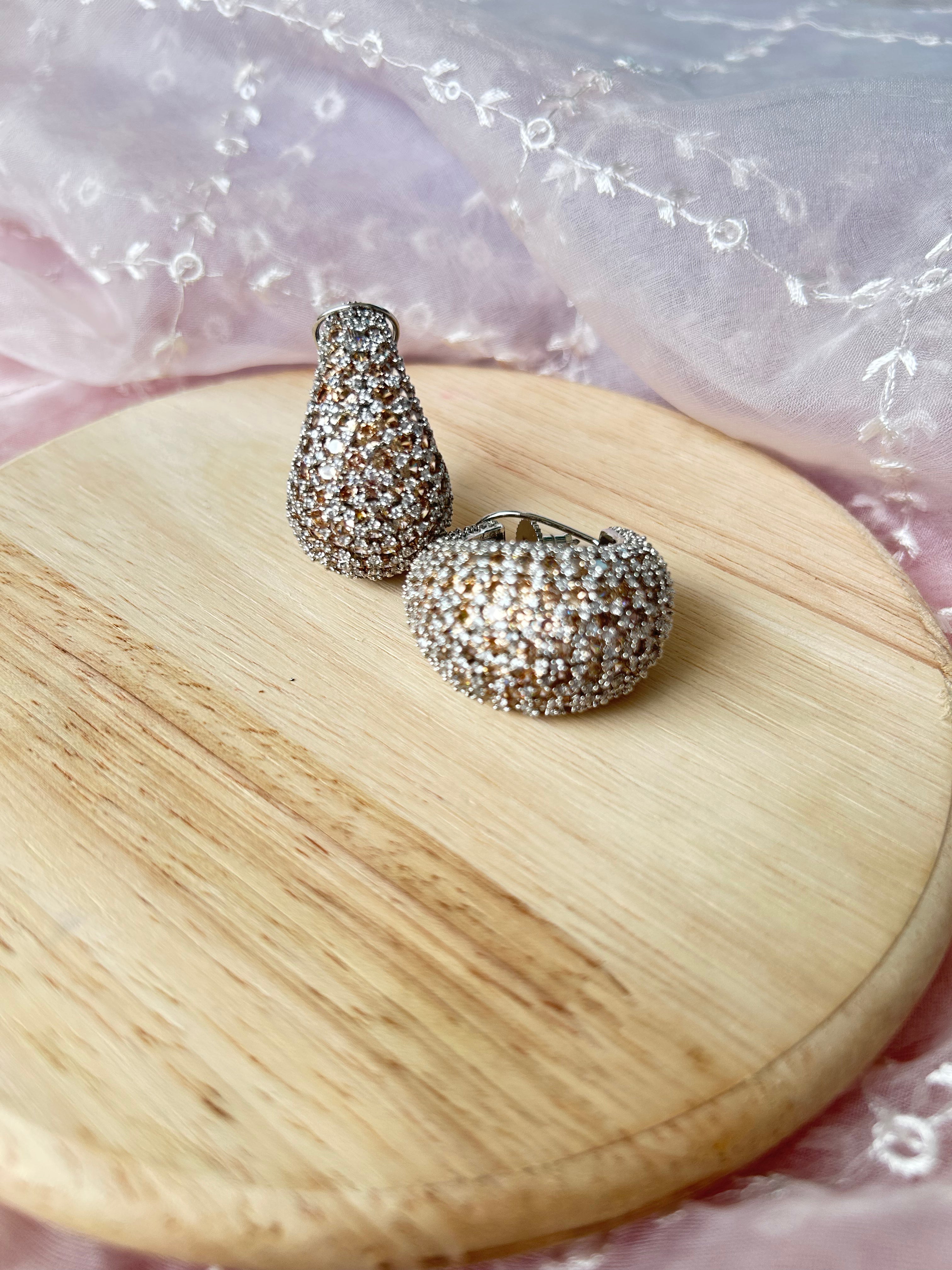 Reva Earrings by KINAHH with colored stones set in silver alloy.