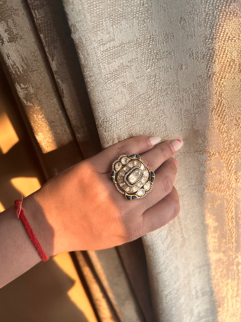 Roza Ring detail view showing moissanite polki detailing in brass.