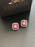 SIA Earrings by KINAHH with American diamonds, red stones and rhodium plating.