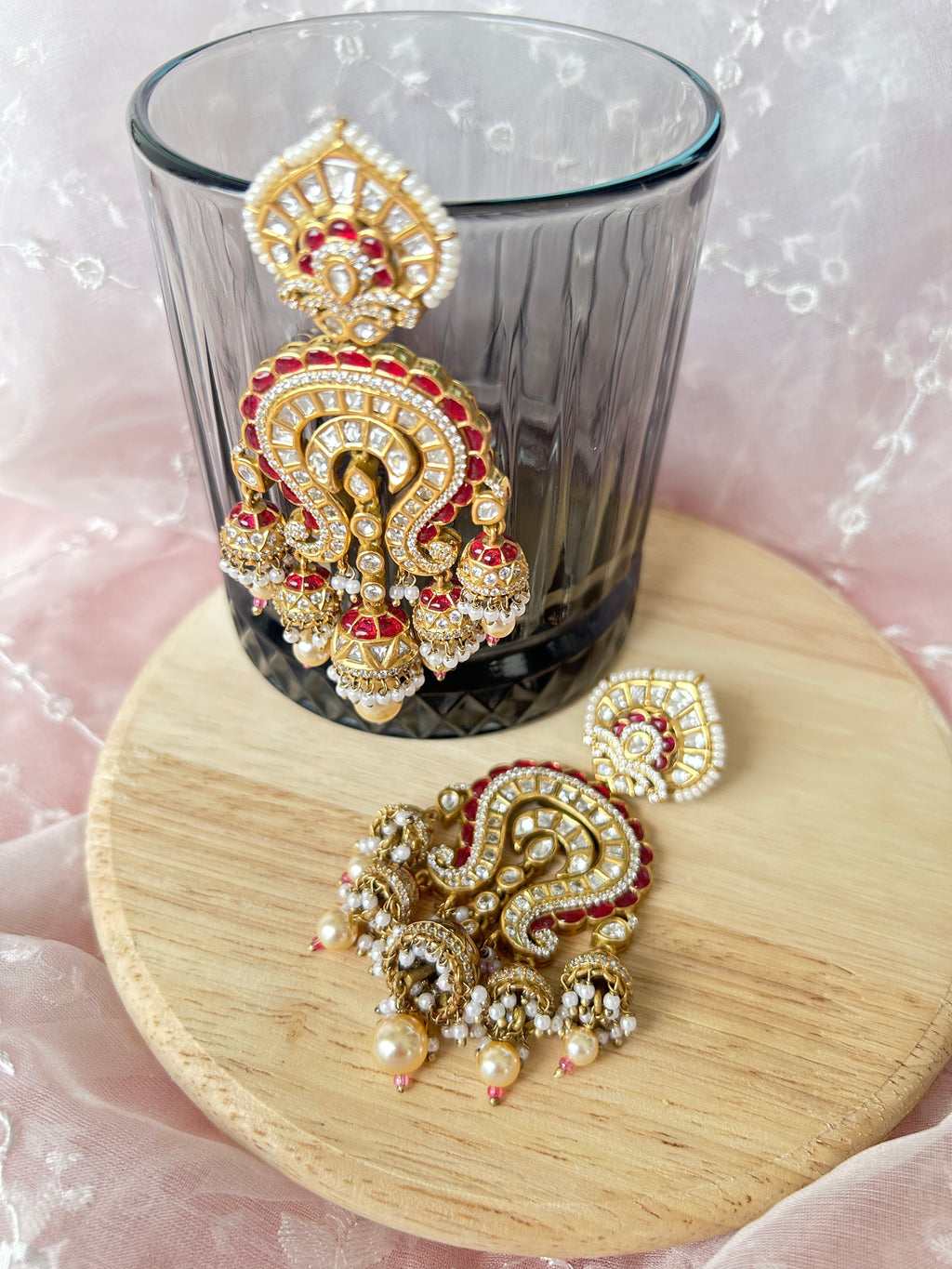 Saanjh Earrings by KINAHH with moissanite polki and red stones in brass.
