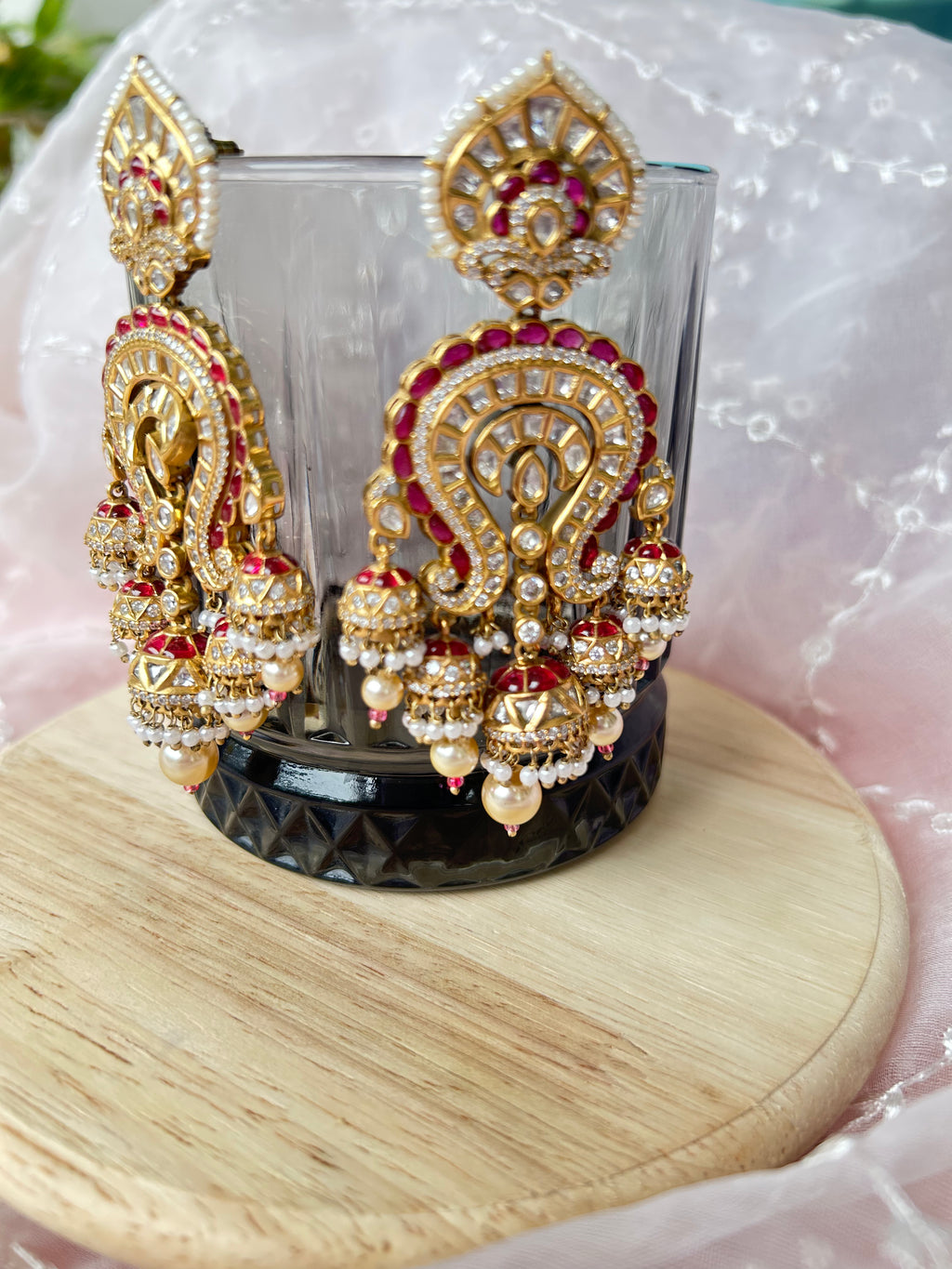 Saanjh Earrings alternate view 3 showing moissanite polki and red stones in brass.