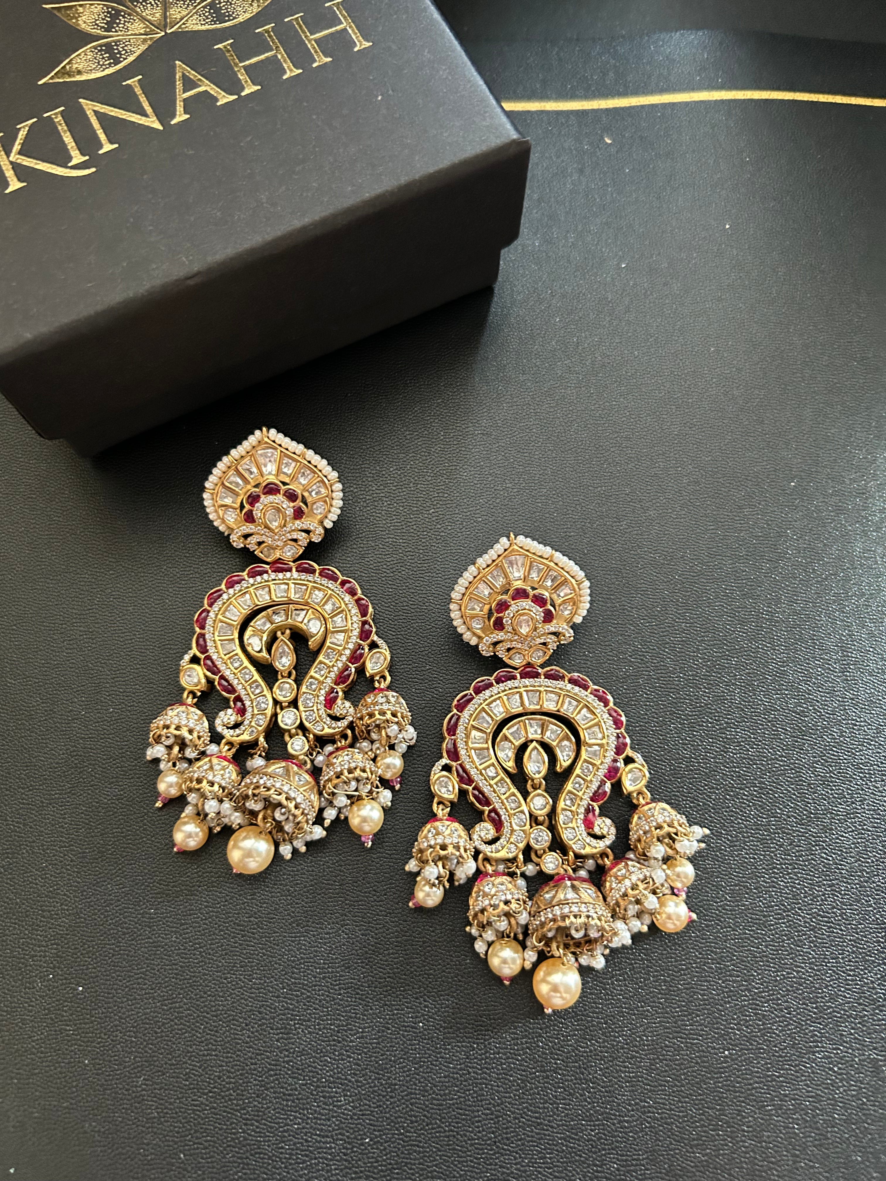 Saanjh Earrings alternate view 8 showing moissanite polki and red stones in brass.