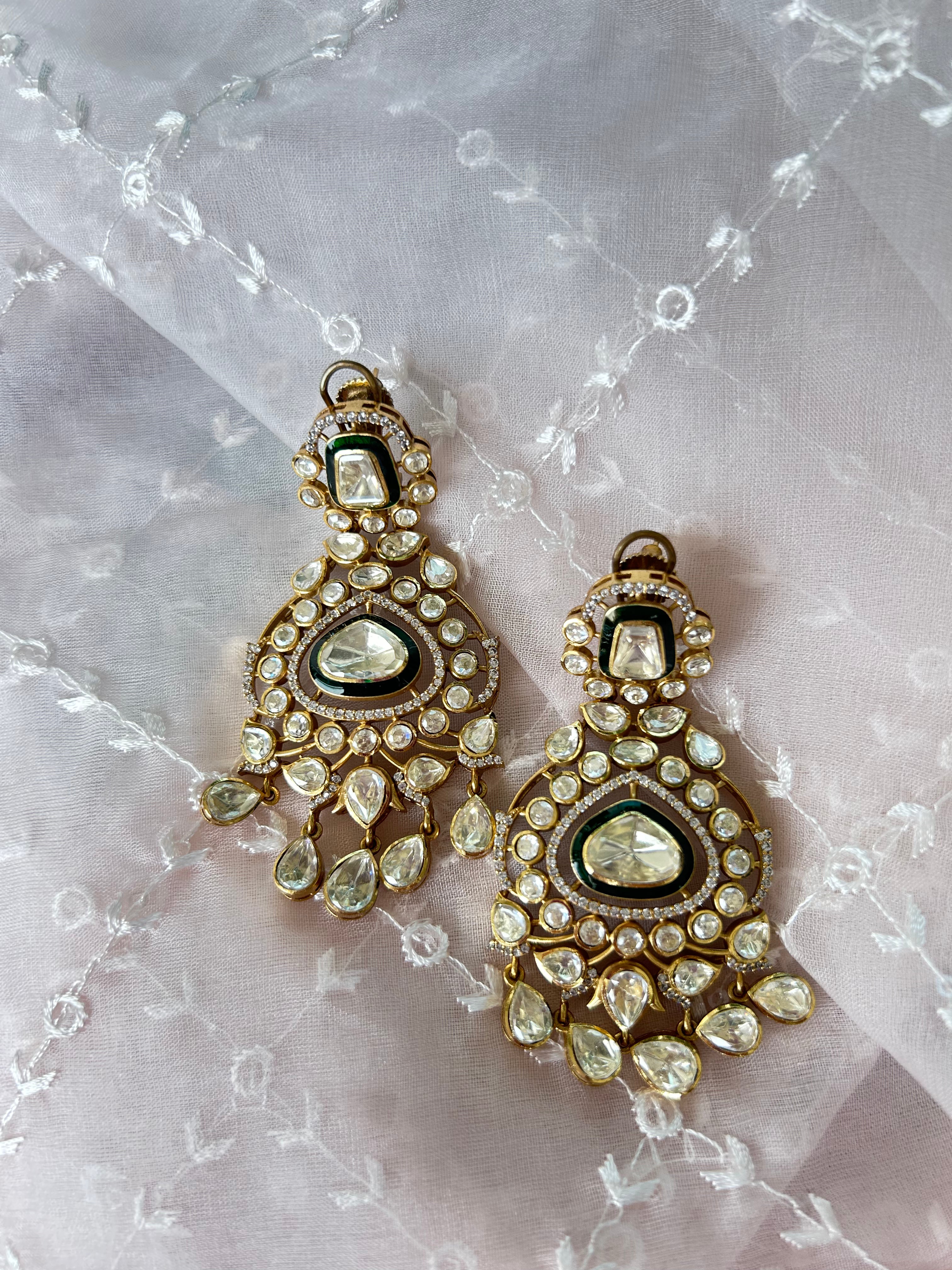 Sitara Earrings detail view showing moissanite polki in brass.