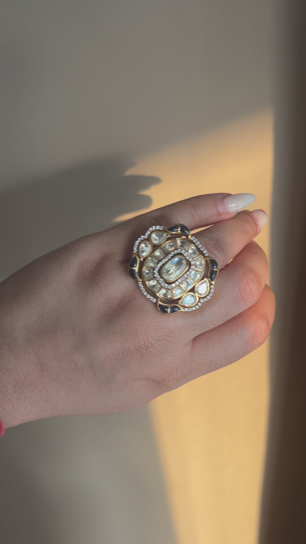 Roza Ring video by KINAHH showing moissanite polki detailing in brass.
