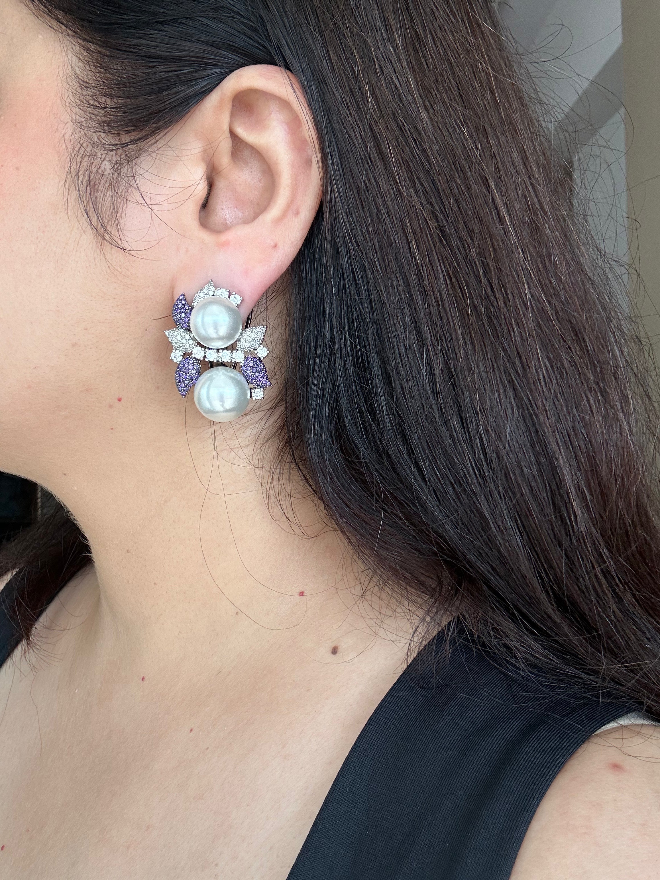 Sephora Earrings worn in profile, showing their size and double white bead design.